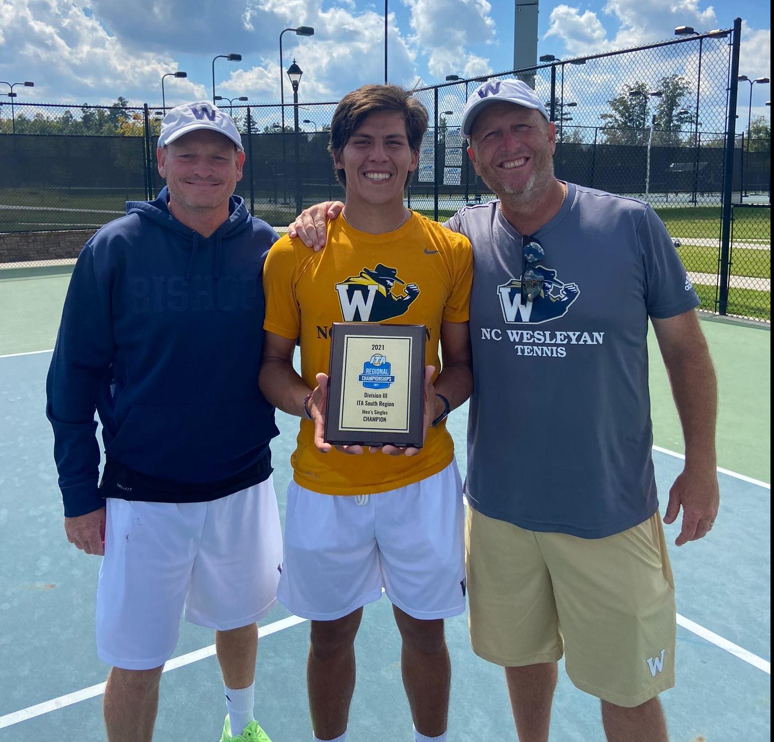 Acosta with Coaches Brice and Rowe after winning the ITAs in September